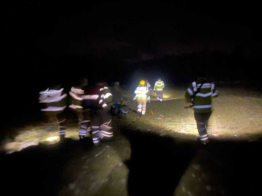 Firefighters save woman from mud