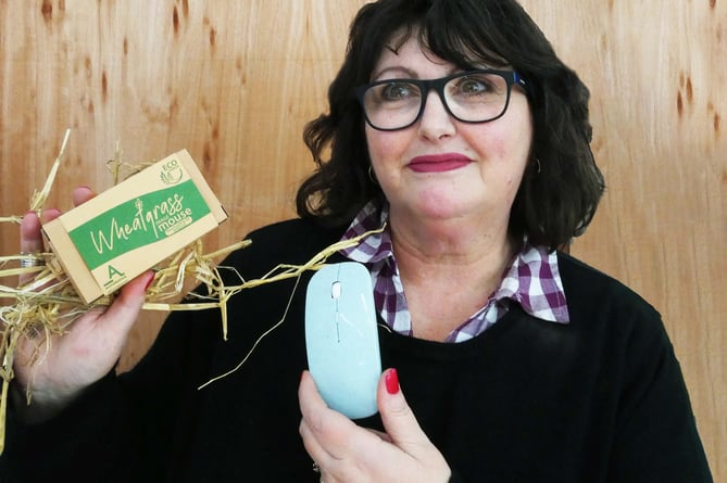 Ceratech Accuratus sales director Angela Lennox shows off the Kingsley company’s biodegradable wheat grass computer mouse