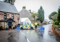 Village reopens after forensic search in murder probe