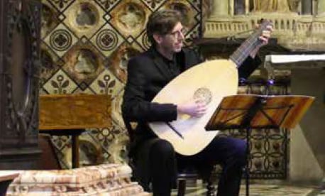 Matthew Nisbet plays the lute at St Peter's Church in Petersfield.