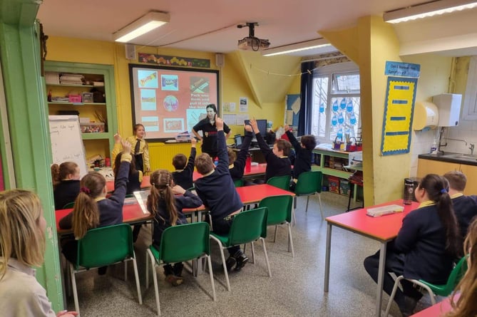 Pupils at St. Teilos School, Tenby with Fair Trade Football Campaign Founder Sharron Hardwick