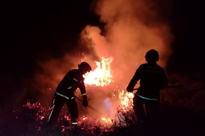 Firefighters tackle the blaze on Dockwell Ridge,Dartmoor. Photo: Buckflastleigh Fire Station