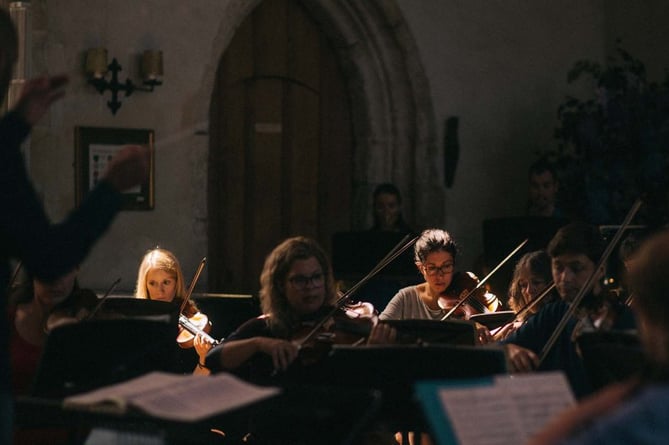 Summer School students performing in the Great Hall