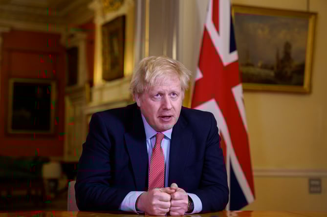 Embargoed til 20.30 23/03/2020. London, United Kingdom. Boris Johnson Covid-19 23/03. The Prime Minister Boris Johnson addressing the Nation in the White Room at No10 Downing Street during the Coronavirus. Picture by Andrew Parsons / No 10 Downing Street
