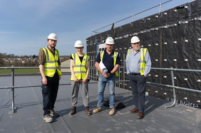 Level 3 NVQ bricklaying apprentice David Deeth (left); Willow Kehily, who also gained site experience; Bryn Roberts, Wynne Construction site manager; and Paul Falzon, Cyfle Building Skills' lead training coordinator for Pembrokeshire and Ceredi-gion.