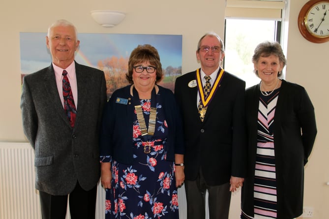 Crediton Lions President Hazel Evely, second left, with left, Mr Alec Hill, and right, Immediate Past District Governor Lion David Fitzpatrick and Mrs Liz Fitzpatrick.  AQ 5798
