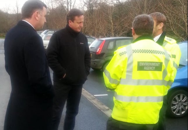 FLASHBACK: MP Mel Stride and David Cameron at the scenes of flooding in Buckfastleigh in 2012.
