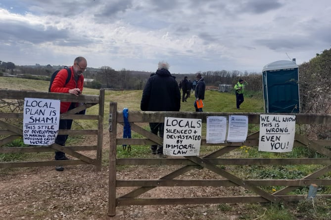 Protesters at the South Hams Council site meeting at Broom Park