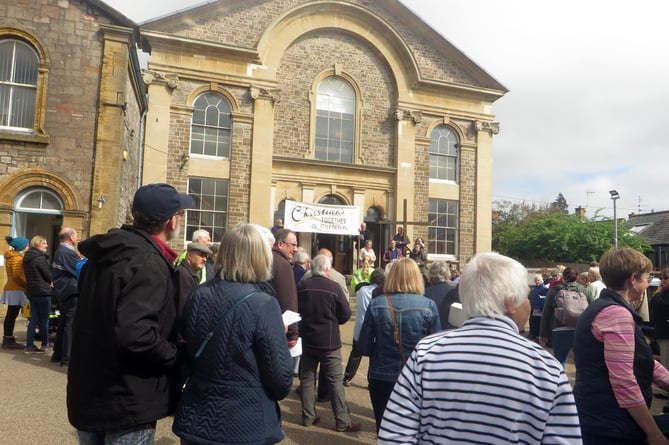 The cross is held at the top of the steps at Crediton Congregational Church where everyone joined in prayer and hymns. SR 1557
