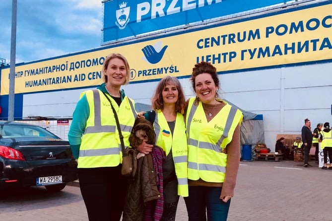 Sara Wheeler, right, volunteered for a week in Poland at the border with Ukraine