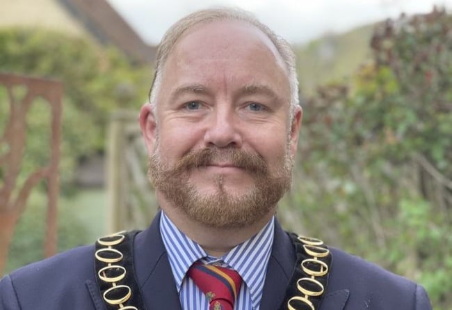 Cllr Adam Carew wearing the East Hampshire District Council chairman’s chain of office, May 2021.