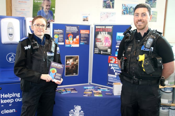 Crediton Neighbourhood Police Team Officers during a recent community consultation held at Crediton's Tesco store at Wellparks.  AQ 5914
