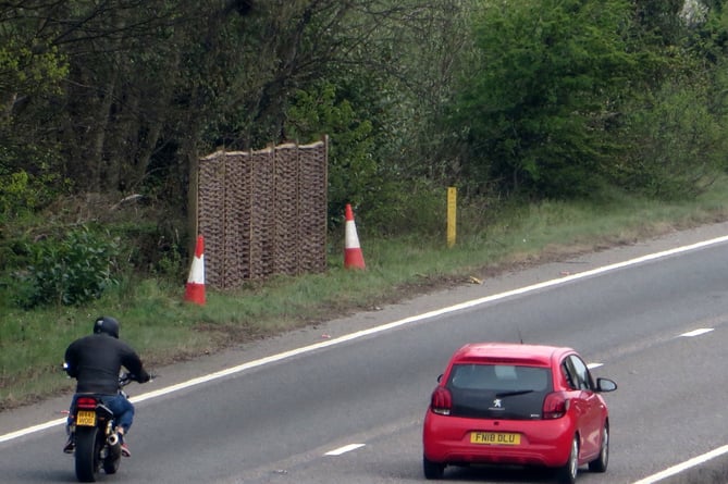 One of the fence panels along the A30.  SR 1580
