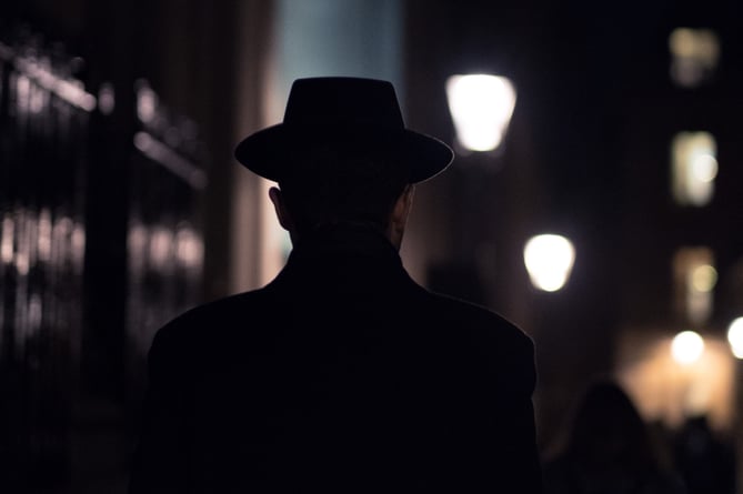 Spy man in hat generic