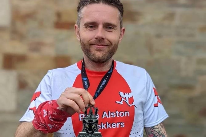 Dave Dencer with his medal