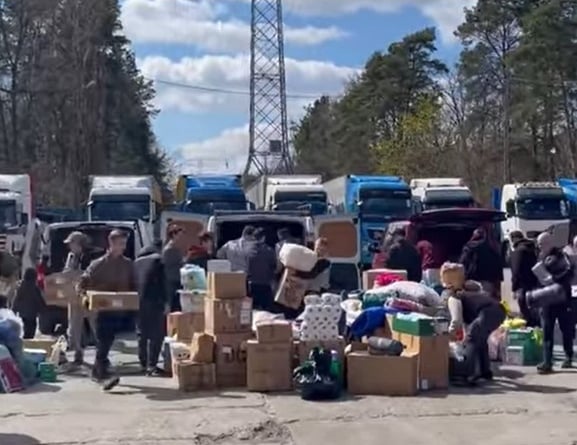 Volunteers in Poland unloading and sorting through some of the supplies brought by Darren’s third aid convoy from Cornwall and Devon
