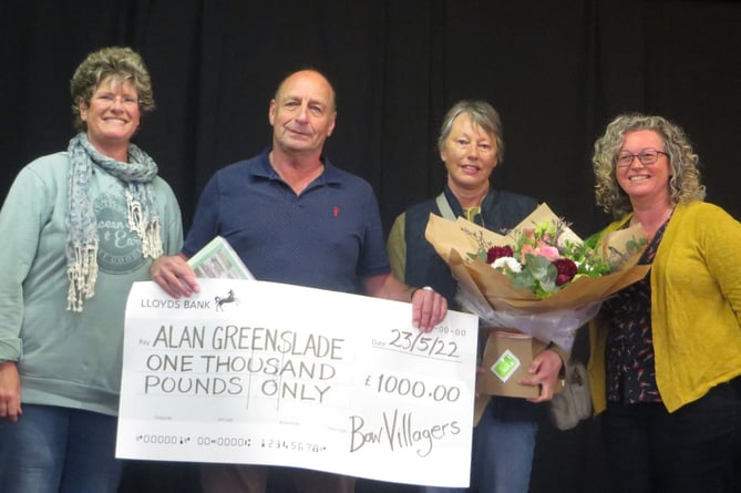 Alan receiving his bumper cheque with his wife, Annette, third left, holding the bouquet of flowers she received, flanked by Karen Gutans, left and Dawn McAllister, right.  SR 1600
