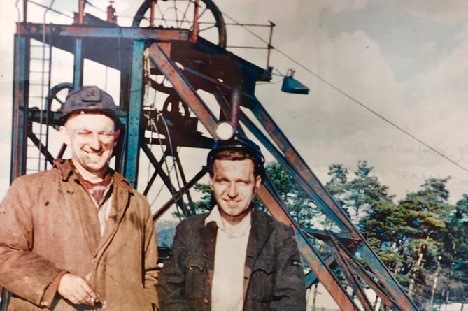 Ray Ashman, right, at Mendip (formerly Strap) Colliery around 1954. The man beside him is the deputy of Mendip Colliery. The winding headgear in the photo is a temporary structure being used when the pit was being inspected and pumped. The winding engine house that replaced it, is still standing at Jackson’s Fencing although the winding gear no longer exists.