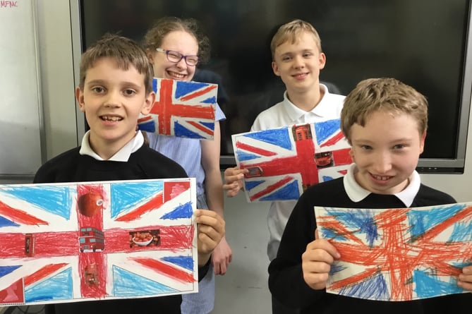 Pupils from Fosseway School with art works they have made to be displayed at the Town’s Jubilee events.