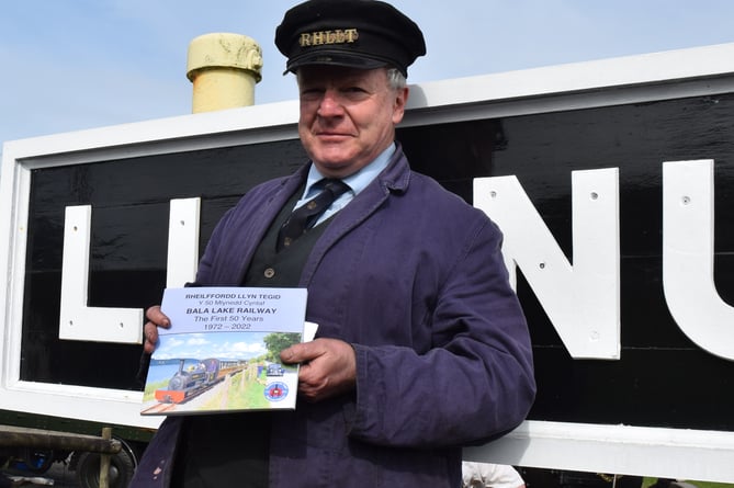 Dr David Gwynn, who welcomed visitors to the railway’s Golden anniversary event, is pictured with the attraction’s latest publication
