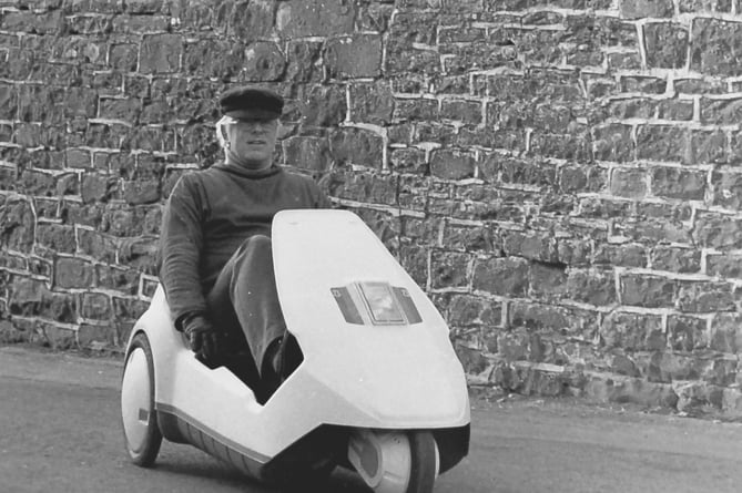 Rev Charles Edwards in his Sinclair C5 in Sandford in February 1985.
