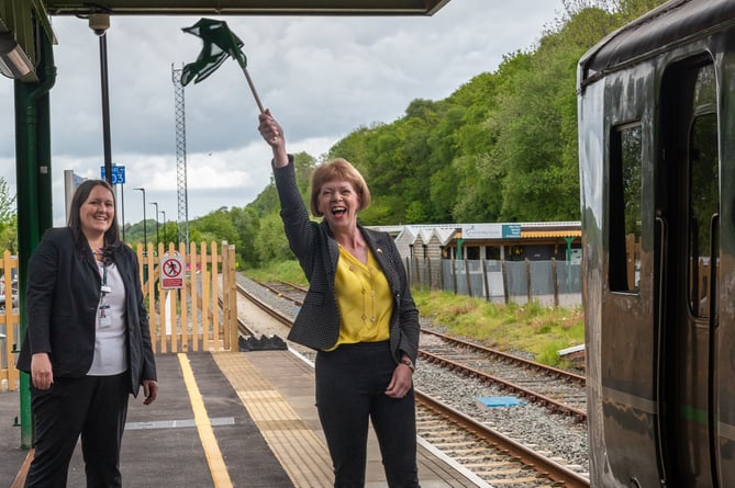 Rail minister Wendy Morton waves off train at Okehampton Station 