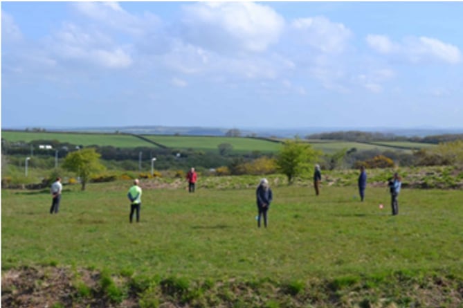 Volunteers marking out the position of a newly discovered stone circle within Castilly Henge