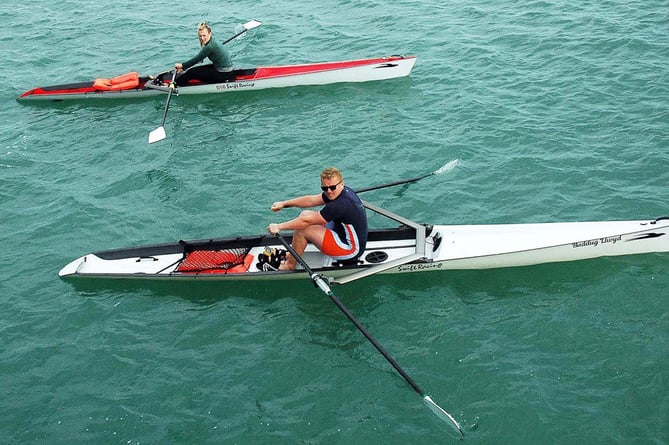 Tim Chesworth and Chloe Evans training on the Dyfi estuary