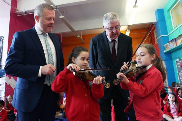 Mark Drakeford and Jeremy Miles at St Joseph’s Cathedral Primary School in Swansea