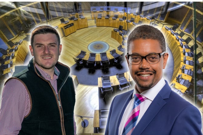 MS James Evans and economy minister Vaughan Gething in front of the Senedd inside