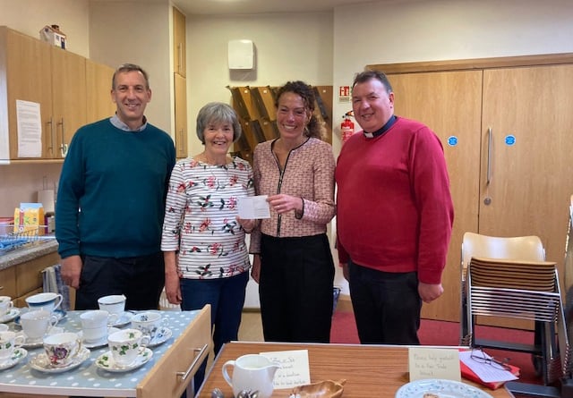 Alton’s Anna Chaplain Kate Powell, third from left, receives a £500 donation to the Anna Chaplaincy Fund from Alton Methodist Church.