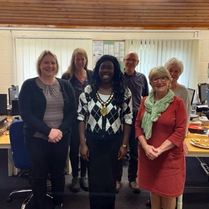Whitehill mayor Cllr Bisi Kennard presents a £1,000 cheque to Citizens Advice East Hampshire.