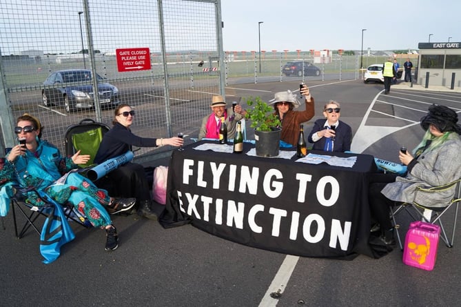 Eco-protestors blockade the entrance to Farnborough Airport