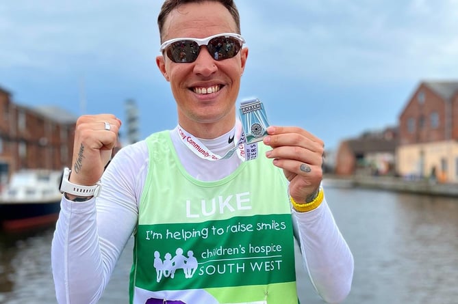 Luke Compton, pictured after finishing this year’s Exeter Marathon in aid of CHSW, will lead the runners at this year’s Rainbow Run at Escot Park on June 19.
