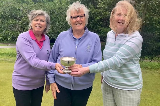 Rees Baker Cup winners, from left, Janice Thwaites, Lady Captain Judith Ezard and Cherry James.

