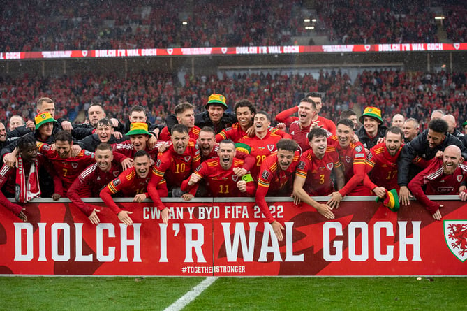 CARDIFF, WALES - 05 JUNE 2022: Wales celebrate at full time during the 2022 FIFA World Cup play-off final between Wales & Ukraine at the Cardiff City Stadium on the 5th of June 2022. (Pic by Ashley Crowden/FAW)