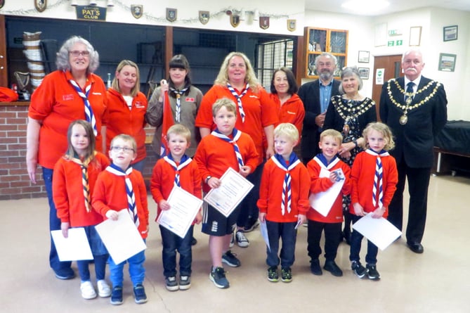 North Tawton Squirrels in their new neckerchiefs with special guests and Leaders. SR 2106