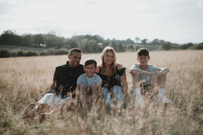Rob Hooper with his family