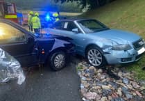 Firefighters assist with casualty extraction at Chudleigh RTC