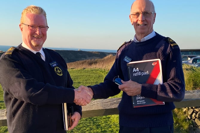 New manager Andy Smith (left) is pictured here with retiring acting manager Malcolm Croasdale, on the right