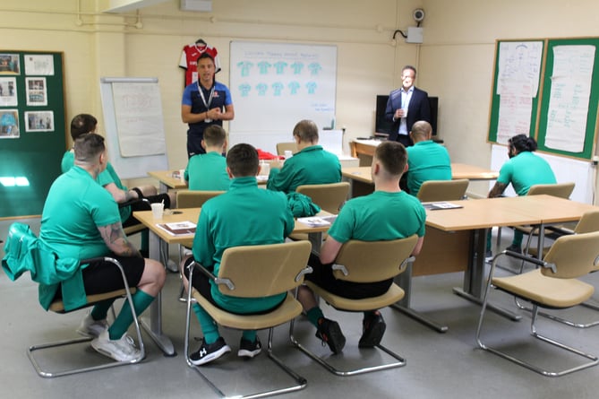 Hilton Freund observes a training session at HMP Exeter delivered by Scott Walker from Exeter City Community Trust.