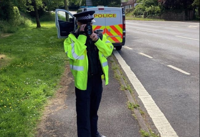Police officer with speed gun