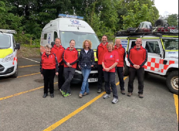 Brecon Mountain Rescue Team volunteers with the team’s ambassador Kate Humble