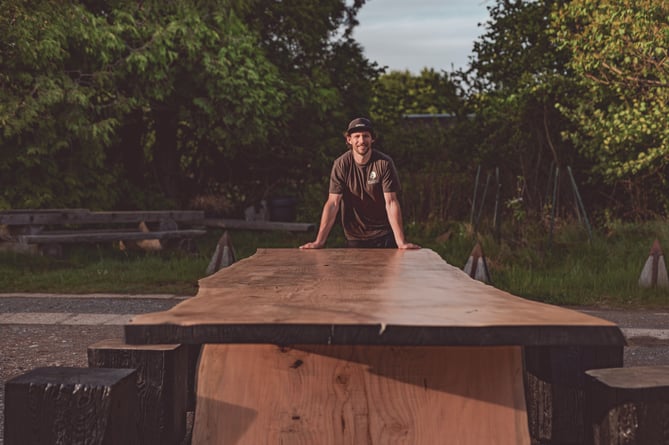 Oli Carter made a single slab table and a sculptural bench for the Chelsea Flower Show