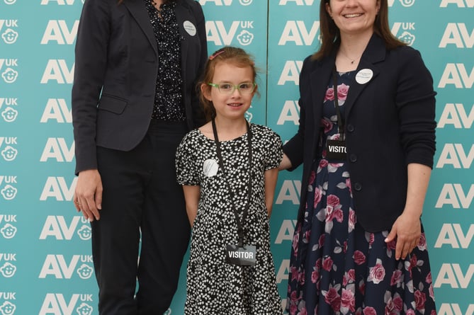 Award-winning teacher Hayley Fisher-Smith, right, with Isabelle Cavanough, the pupil who nominated her, and her mother Elise Cavanough.