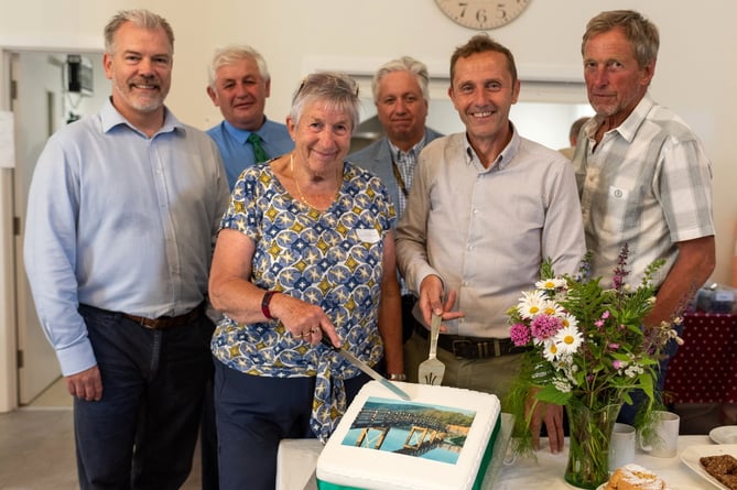 The Tamar Valley AONB team with the cake to celebrate the opening of the new walkway at Calstock