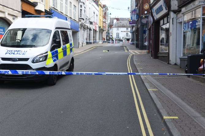 The scene yesterday as police sealed off Monnow Street