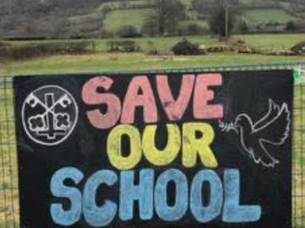 A sign at the school campaigning for it to be saved