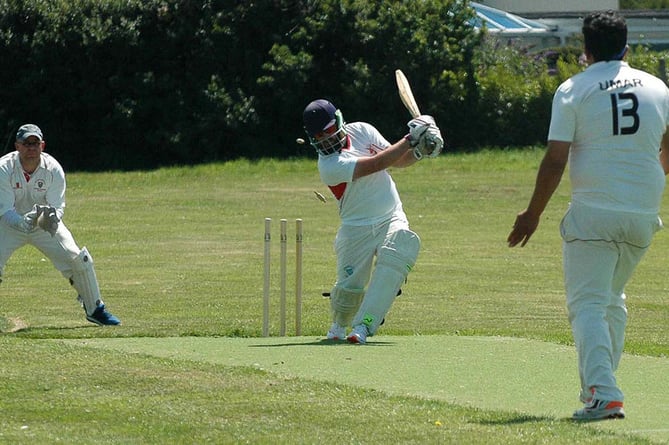 Tywyn’s Matthew Maslin bowled out by Aberystwyth University Commoners Umar Aslam. West Wales Conference