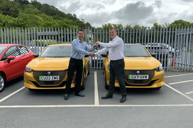 New EV at Brecon Beacons College. Daniel Pritchard and Kevin Payne pictured.